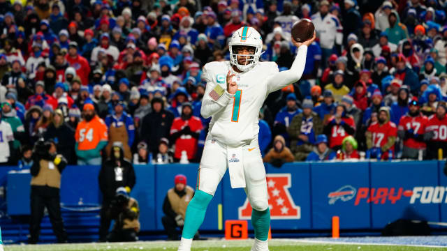 Dec 17, 2022; Orchard Park, New York, USA; Miami Dolphins quarterback Tua Tagovailoa (1) throws the ball against the Buffalo Bills during the second half at Highmark Stadium.